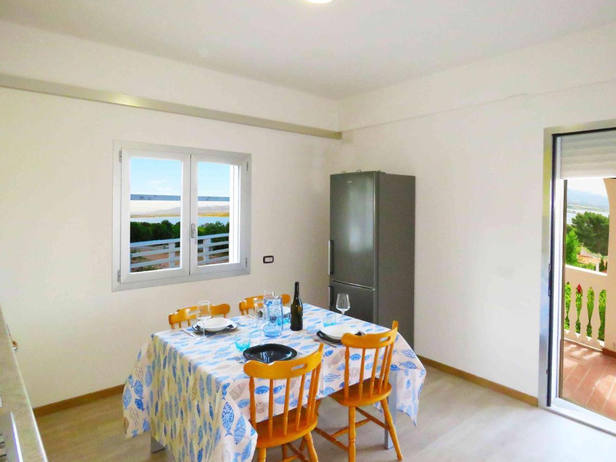 Panohome Porto Pino Exterior foto