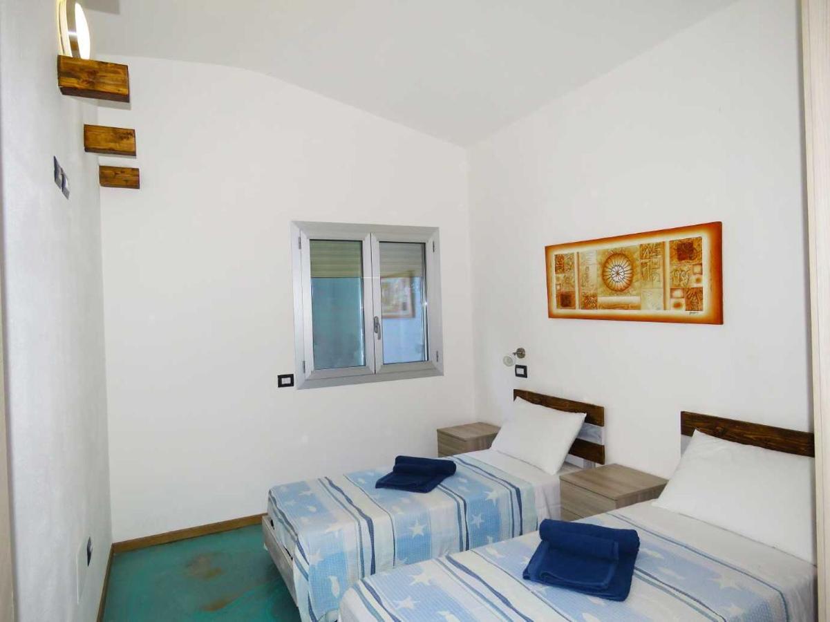 Panohome Porto Pino Exterior foto